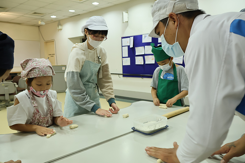 In a bid to foster inclusivity and cultural exchange, students and teachers from the Thai-Japanese Association School embarked on a unique culinary journey at the Asia-Pacific Development Center on Disability (APCD) today, February 6, 2024. The focal point of their visit? A hands-on workshop centered around the art of baking with a special focus on Yamazaki bakery delicacies. Under the guidance of seasoned chefs and facilitators, participants immersed themselves in the intricate process of crafting Yamazaki bakery treats. From mastering dough techniques to perfecting the art of shaping and decorating pastries, the workshop provided a platform for both learning and creativity. What set this event apart, however, was its emphasis on inclusivity. With APCD's commitment to creating an accessible environment for all, the workshop was tailored to accommodate diverse needs and abilities. Students and teachers alike were able to engage fully in the baking experience, breaking down barriers and fostering a sense of unity. "The essence of today's workshop goes beyond baking," remarked one of the organizers. "It's about creating an environment where everyone feels valued and included, regardless of any differences. Food has a remarkable power to bring people together, and today, we witnessed the beauty of that unity." For the students of the Thai-Japanese Association School, the workshop served as a window into Japanese culture and culinary traditions, enriching their educational journey with practical experiences and cross-cultural insights. As the aroma of freshly baked goods filled the air and laughter echoed through the halls of APCD, it was evident that the workshop had achieved its goal of fostering not only culinary skills but also a sense of belonging and understanding among all participants. With initiatives like these paving the way, the journey towards a more inclusive society takes a significant step forward, one delicious recipe at a time.