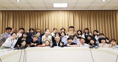 A group photo was taken with students, lecturers, and APCD staff.