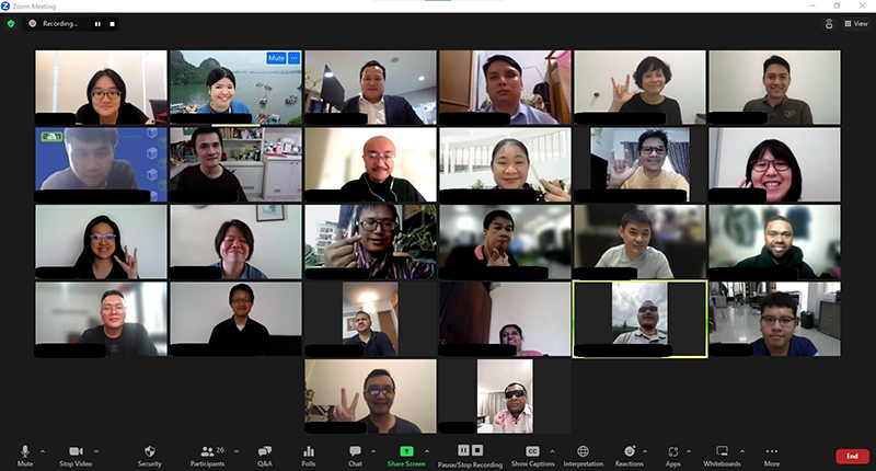 Group photo of participants, DET tutors, sign language interpreters, and APCD Zoom operators from Asia-Pacific countries.