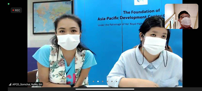 (Left) Ms. Siriporn Praserdchat (Logistics Officer) and (Right) Ms. Supaanong Panyasirimongkol, Officer of Networking & Collaboration discuss what APCD will be presenting at the AAN conference.