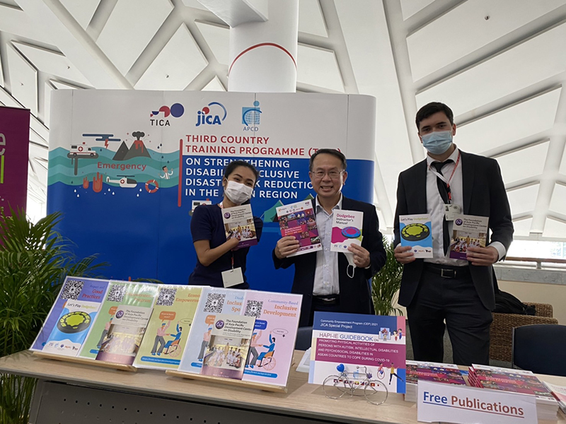 On the second day of the exhibition booth, the APCD director visits. (Left to Right) Ms. Siriporn Praserdchat (Logistics Officer), Mr. Piroon Laismit (Executive Director), Mr. Evan Hall (Intern).