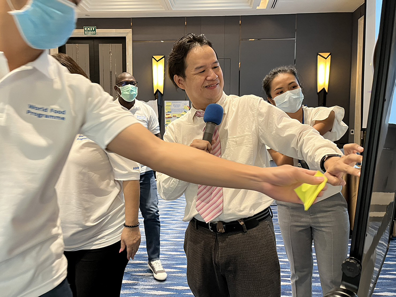 Mr. Watcharapol Chuengcharoen, Chief of Networking and Collaboration, and (Right) Ms. Siriporn Praserdchat, Logistics Officer, begin the DET session with introductions and an overview of the topics that was discussed.