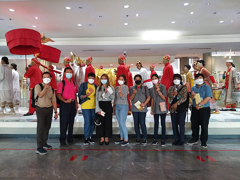 Group photo of participants, their Golden Jubilee Museum colleagues, and APCD project staff in front of the Royal Ploughing Ceremony wax model