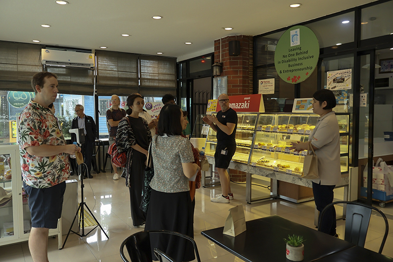 Touring session at APCD 60+ Bakery & Café, facilitated by Ms. Supaanong Panyasirimongkol, Networking & Collaboration Officer  