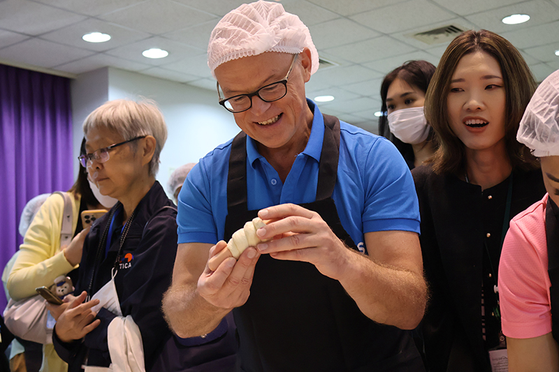 The event's highlight was the interactive baking session, where participants learned the art of bread-making from a talented chef and members of the APCD with disabilities. 