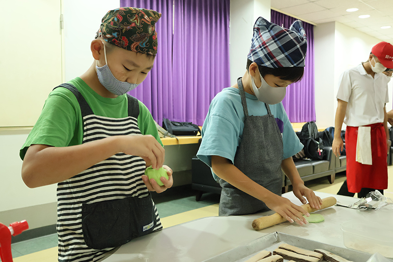 In a bid to foster inclusivity and cultural exchange, students and teachers from the Thai-Japanese Association School embarked on a unique culinary journey at the Asia-Pacific Development Center on Disability (APCD) today, February 6, 2024. The focal point of their visit? A hands-on workshop centered around the art of baking with a special focus on Yamazaki bakery delicacies. Under the guidance of seasoned chefs and facilitators, participants immersed themselves in the intricate process of crafting Yamazaki bakery treats. From mastering dough techniques to perfecting the art of shaping and decorating pastries, the workshop provided a platform for both learning and creativity. What set this event apart, however, was its emphasis on inclusivity. With APCD's commitment to creating an accessible environment for all, the workshop was tailored to accommodate diverse needs and abilities. Students and teachers alike were able to engage fully in the baking experience, breaking down barriers and fostering a sense of unity. "The essence of today's workshop goes beyond baking," remarked one of the organizers. "It's about creating an environment where everyone feels valued and included, regardless of any differences. Food has a remarkable power to bring people together, and today, we witnessed the beauty of that unity." For the students of the Thai-Japanese Association School, the workshop served as a window into Japanese culture and culinary traditions, enriching their educational journey with practical experiences and cross-cultural insights. As the aroma of freshly baked goods filled the air and laughter echoed through the halls of APCD, it was evident that the workshop had achieved its goal of fostering not only culinary skills but also a sense of belonging and understanding among all participants. With initiatives like these paving the way, the journey towards a more inclusive society takes a significant step forward, one delicious recipe at a time.