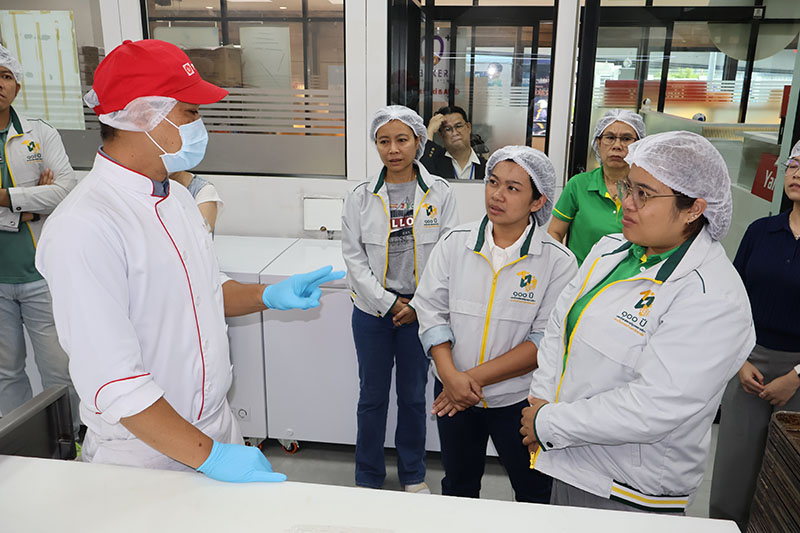 The visiting group observed the tangible impact of APCD's projects, including the 60+ Plus Bakery & Chocolate Café and the 60+ Plus Kitchen by CP.