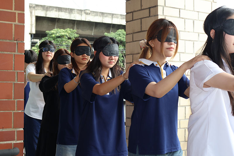 Mr. Watcharapol Chuengcharoen, led an interactive session on the social model of disability. Students participated in experiential learning to better understand the lived experiences of persons with visual impairments.