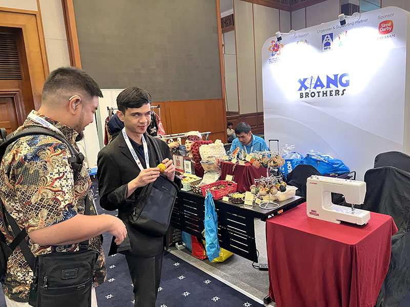 Collecting materials from Exhibitors, establishing documentation exchange practice.