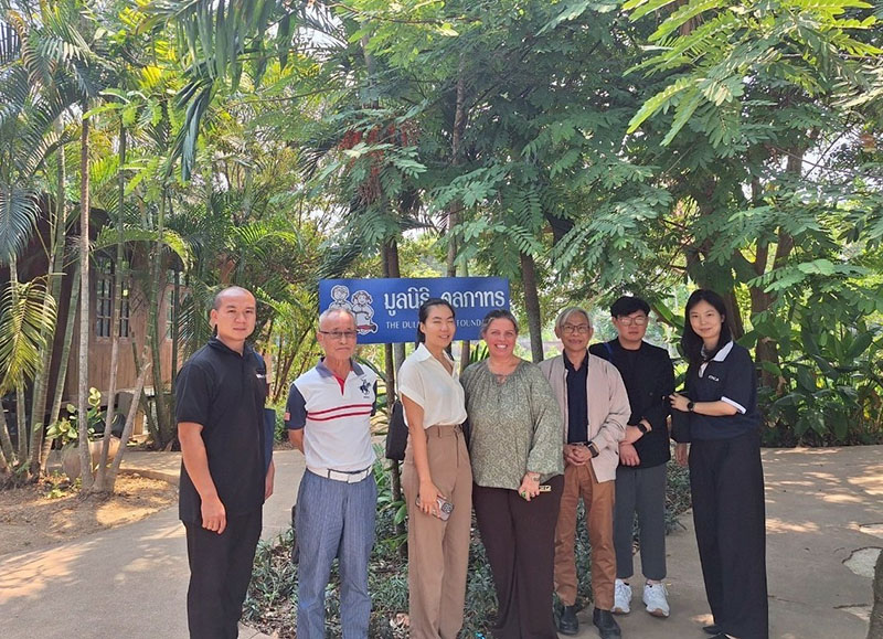 Group photo among meeting participants at DBF office 