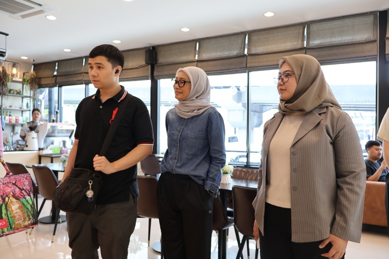 Three delegates from LSPR-SSNE touring the 60+Plus Bakery & Chocolate Cafe. From left to Right: Mr. Muhammad Abijdzar Alghivari, Office Administrator from the ASEAN Autism Network (AAN), Dr. Chrisdina M.Si., Dean of Faculty of Special Education, and Ms. Novita Sari, lecturer, Faculty of Special Education.