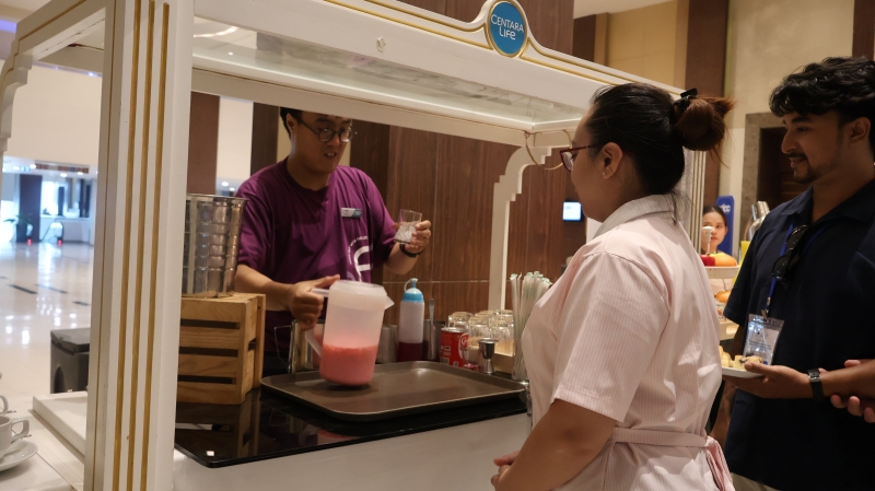 Participants observed a barista demonstration by an employee with autism at Centara Life Government Complex Hotel. He previously completed APCD skills-development training that supported his workplace preparation.