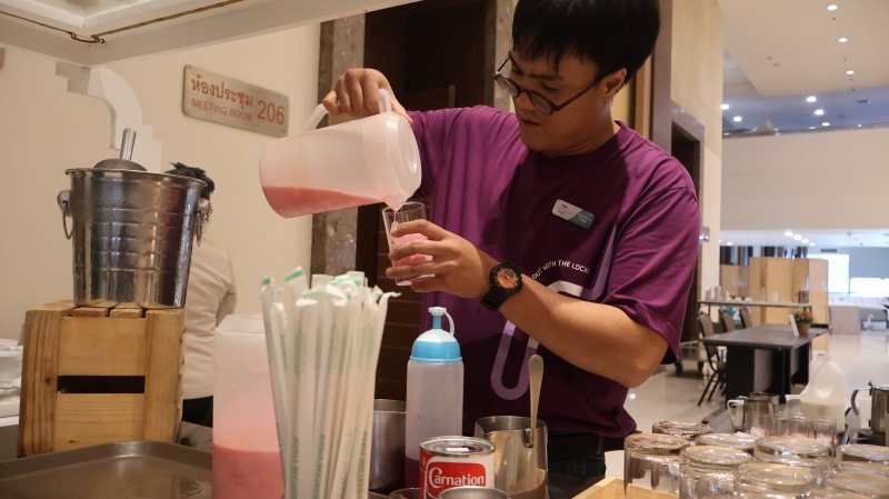 The employee with autism prepared beverages from his own recipes and demonstrated the skills and confidence he developed in the workplace.