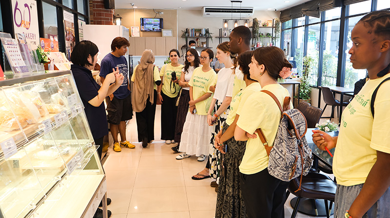 Picture 5: Ms. Supaanong Panyasirimongkol, facilitate the visitor for tour to 60+ Plus Bakery & Café and observed the "Skills Development for Persons with Disabilities" program, including the APCD 60+ Plus Kitchen by CP.