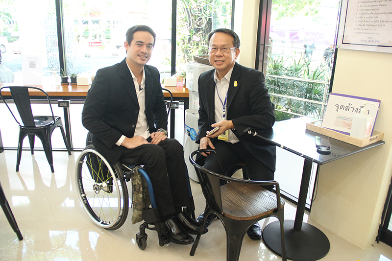 Photo session of Mr. Michael Walker and Mr. Piroon Laismit during accessibility check inside the Café