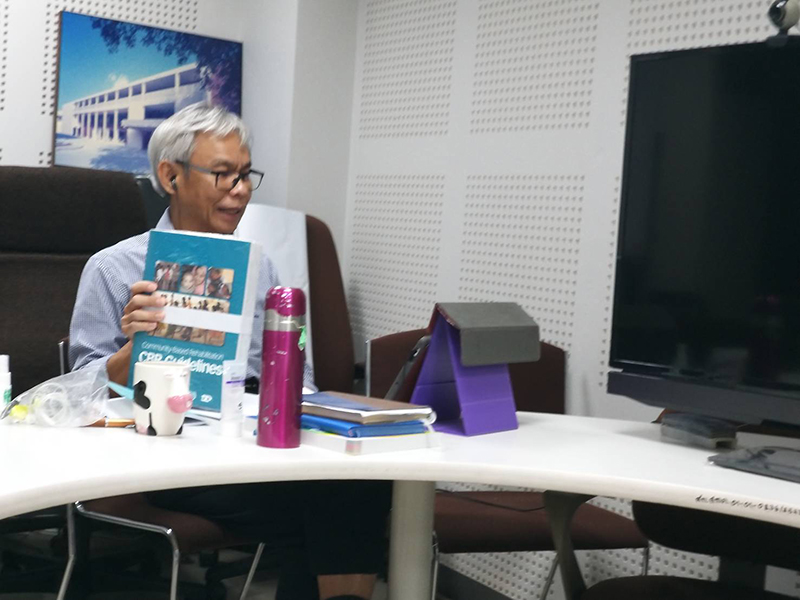 Mr. Somchai showed a series of CBR guideline booklets by WHO to the students.