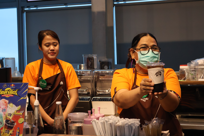 Visit to Punthai Coffee to observe persons with disabilities at work. 