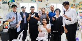 Picture 1: From left to right, Mr. Thanawat Deesawat, Mr. Chusak Chantayanon, service users, Mr. Yong Sulaiman, Mr. Pramote Thammasaroch, staff member, Mr. Krittapol Chamrasromran, and Ms. Nongnuch Maytarjittipun (seated in a wheelchair in front Mr. Yong Sulaiman) pose for a group photo