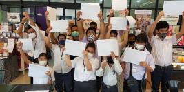 Participants, resource persons, and project staff gathered in a group shot.