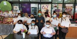 1.	A group shot of participants and resource persons on skill development training for Thai individuals with disabilities who completed the training course on Chocolate Café & Barista.