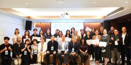 Photo 1: Participants pose for a group photo with their certificates upon completing the Job Coach Training, marking their achievement and commitment to supporting disability-inclusive employment.