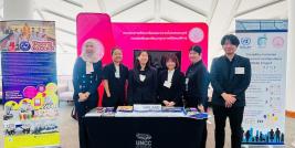 A group photo of APCD and DEP staff at the booth for UNESCAP Commission Session 82, capturing their strong spirit and active commitment in promoting DIEB.