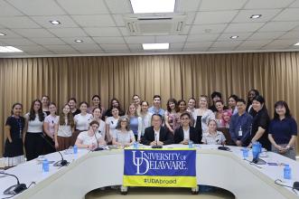 Group photo of students, professors and APCD executive director and staff.