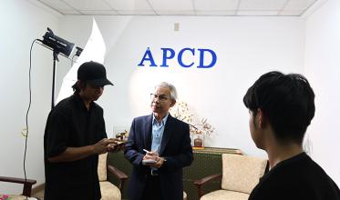 Photo 1: APCD Community Development Manager was interviewed to share the knowledge and experiences about Disability-Inclusive Disaster Risk Reduction (DIDRR).