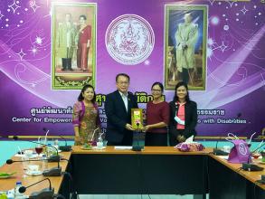 Mrs. Ubol Thongsalubluan, Provincial Social Development and Human Security Officer; Ms. Onanong Kumhang, Director of Center for Empowerment and Vocational Development for Persons with Disabilities in Nakhon Si Thammarat Province; and Mrs. Sarudda Promma, Head of Nakhon Sri Thammarat Shelter for Children, and their families presented Mr. Piroon Laismit, APCD Executive Director, with a token of appreciation.