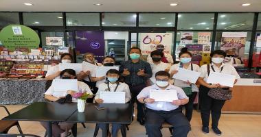 1.	A group shot of participants and resource persons on skill development training for Thai individuals with disabilities who completed the training course on Chocolate Café & Barista.