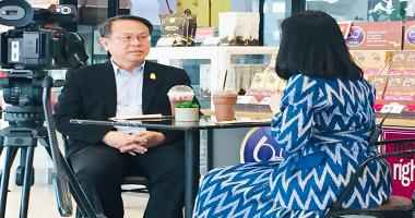 Executive Director, Mr. Piroon Laismit and Ms. Pornnika Garnjana-Goonchorn, as interviewer emceeing the program